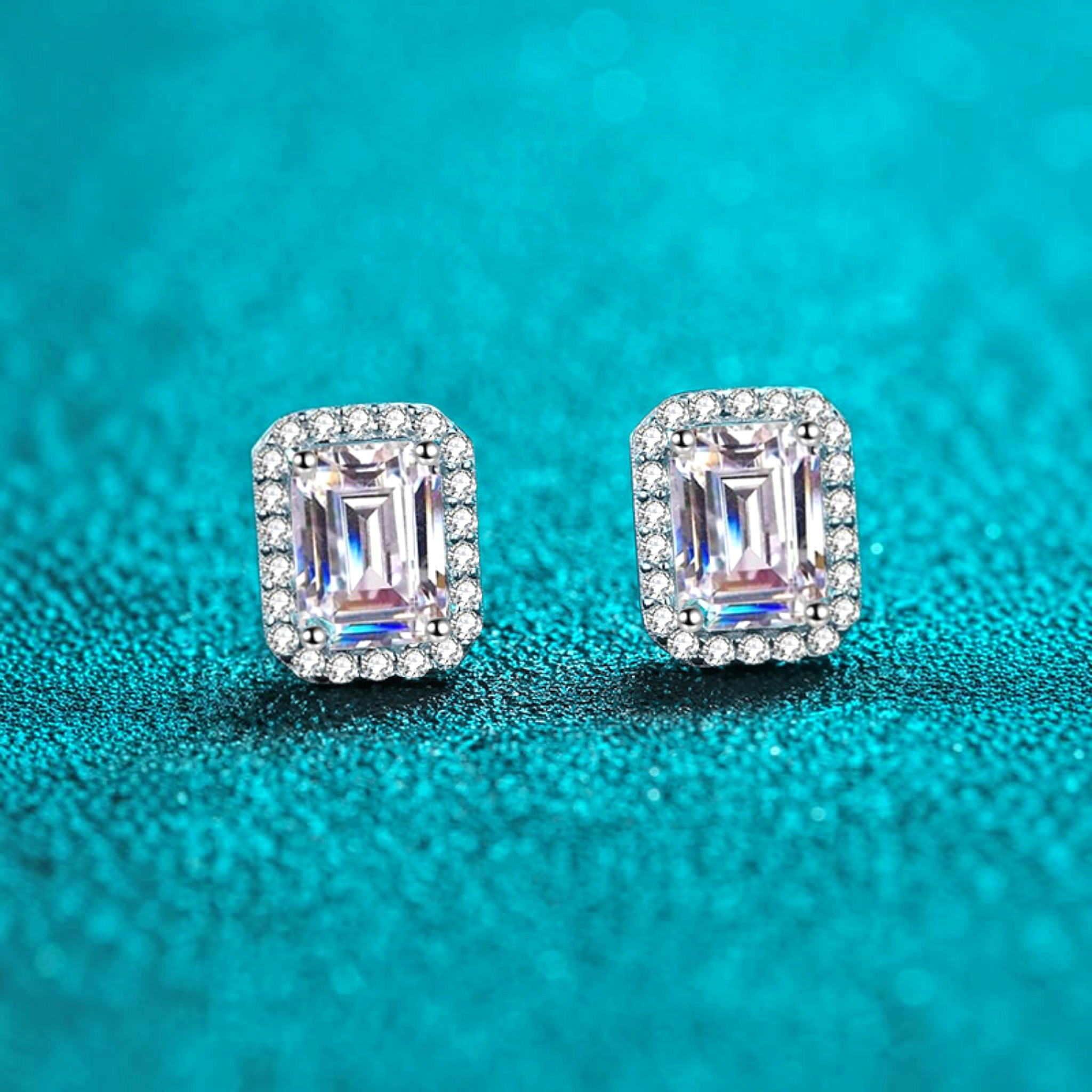 Beach Rose Co. rectangular moissanite stud earrings with zircon halos set in rhodium-plated sterling silver.