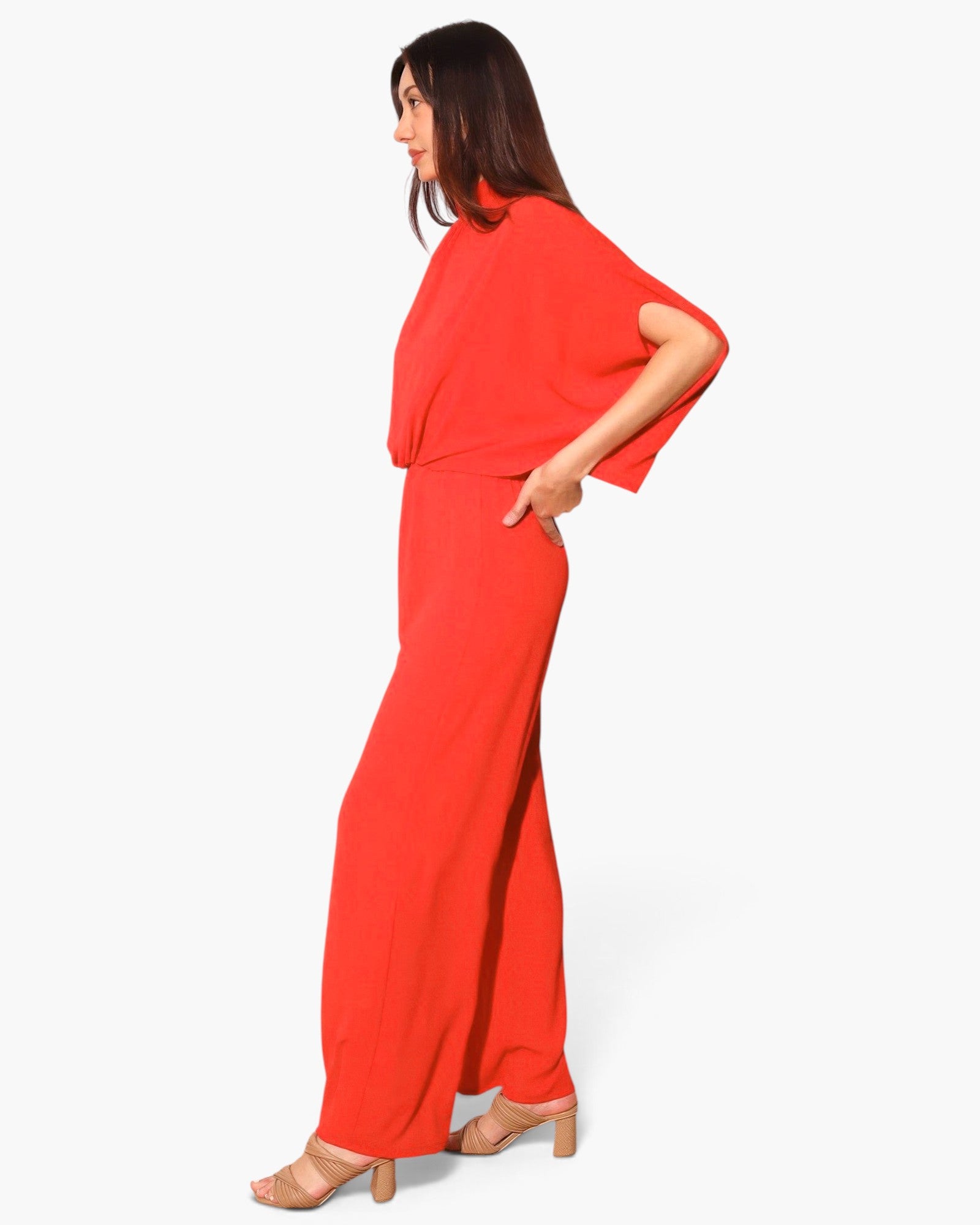 Beach Rose Co. red textured mock neck caftan jumpsuit with wide sleeves and flowing silhouette on a model