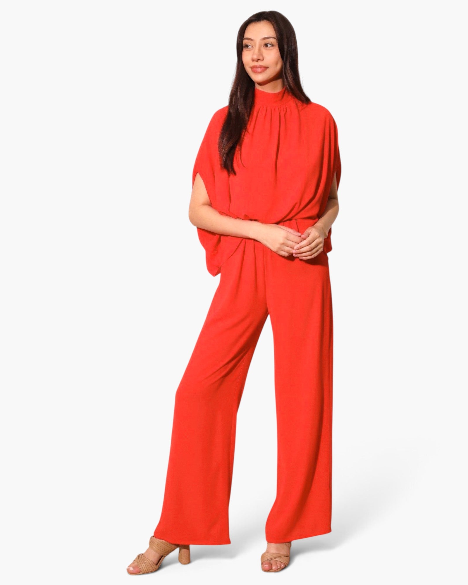 Beach Rose Co. red textured mock neck caftan jumpsuit with a flowing silhouette worn by a model on a white background