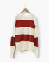 Beach Rose Co. red and cream wide stripe V-neck sweater with dropped shoulders and textured knit sleeves on a hanger.