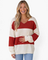 Beach Rose Co. red and cream wide stripe V-neck sweater with dropped shoulders and textured knit sleeves on a model.