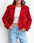 Beach Rose Co. red cropped double-breasted trench jacket with wide lapels and buckled cuffs worn with light blue jeans