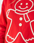 Beach Rose Co. red sweatshirt featuring a smiling gingerbread man with textured cream trim and decorative buttons.
