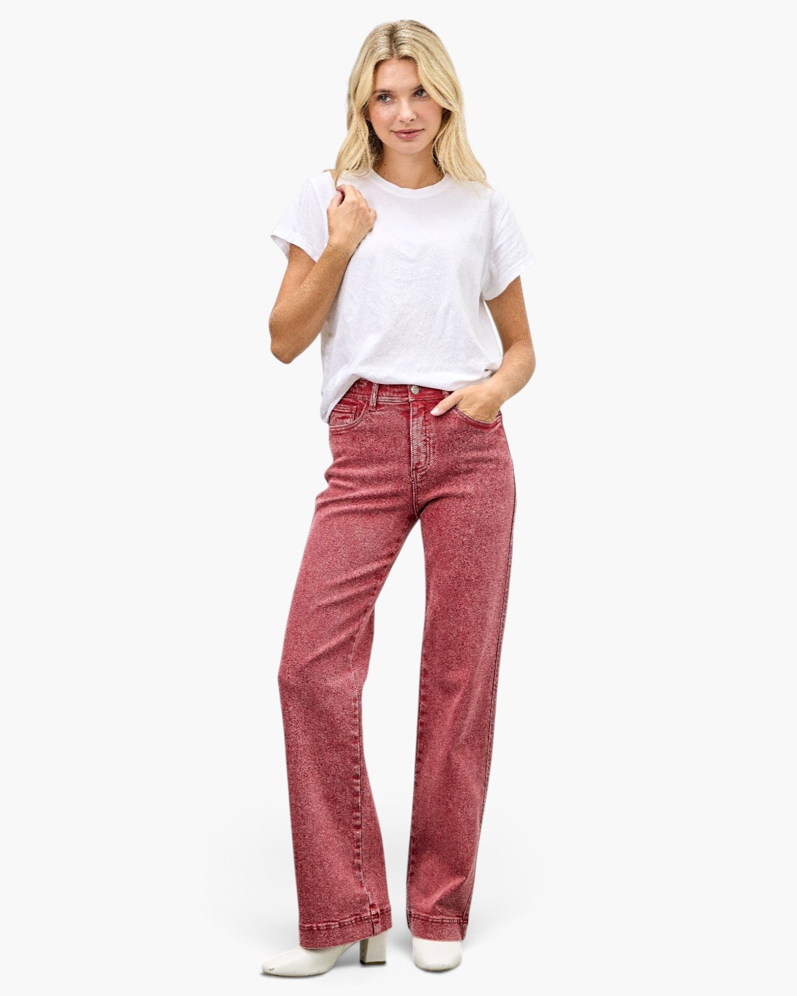 Beach Rose Co. model wearing red high-rise slim wide straight jeans and a white t-shirt against a white background.