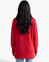Beach Rose Co. red relaxed knit sweater with dropped shoulders and exposed seams viewed from the back
