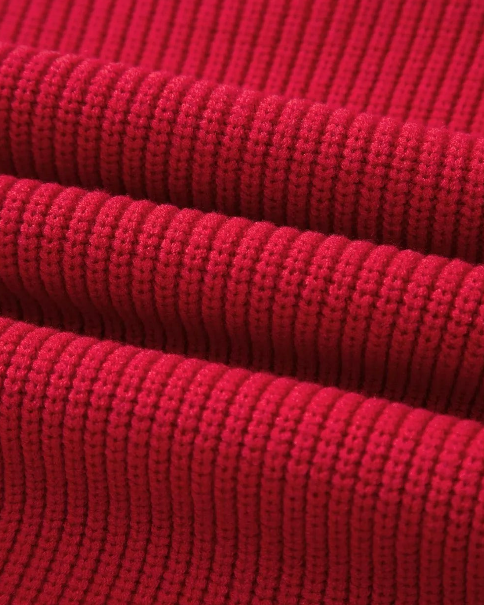 Beach Rose Co. red textured knit sweater fabric close up showing ribbed pattern and soft material detail
