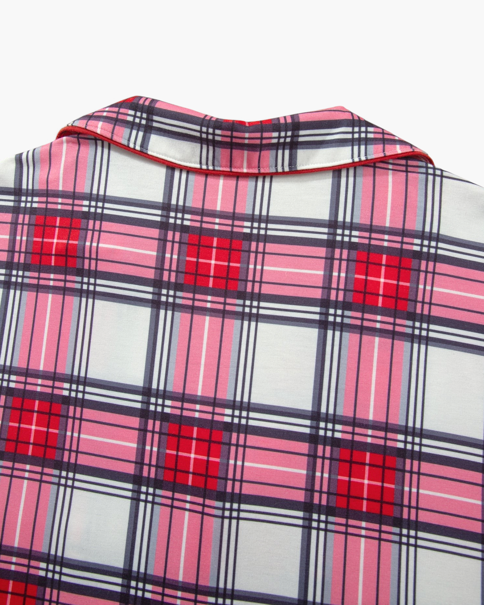 Beach Rose Co. plus size pajama set featuring a red, pink, and white plaid pattern with contrasting red piping
