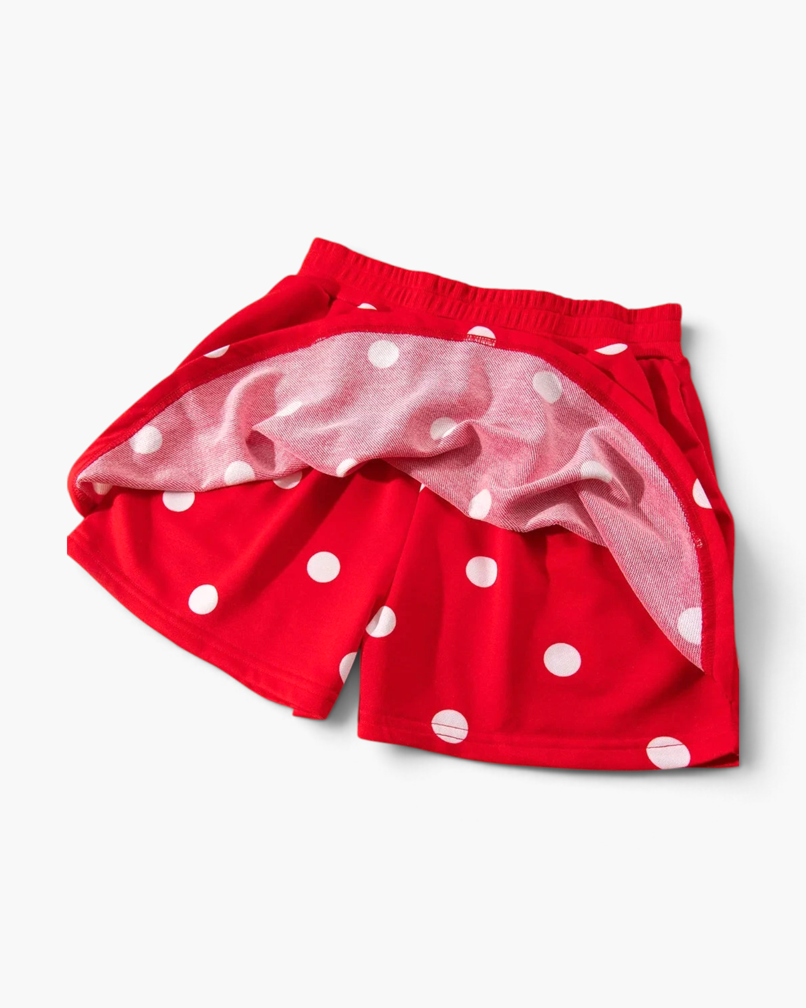 Beach Rose Co. red and white polka dot polyester skort with a flared skirt overlay and elastic waistband.