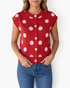 Beach Rose Co. red sleeveless sweater vest with white polka dots and gold decorative buttons worn with blue jeans