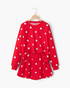 Beach Rose Co. red and white polka dot polyester sweatshirt and skort set on a hanger.