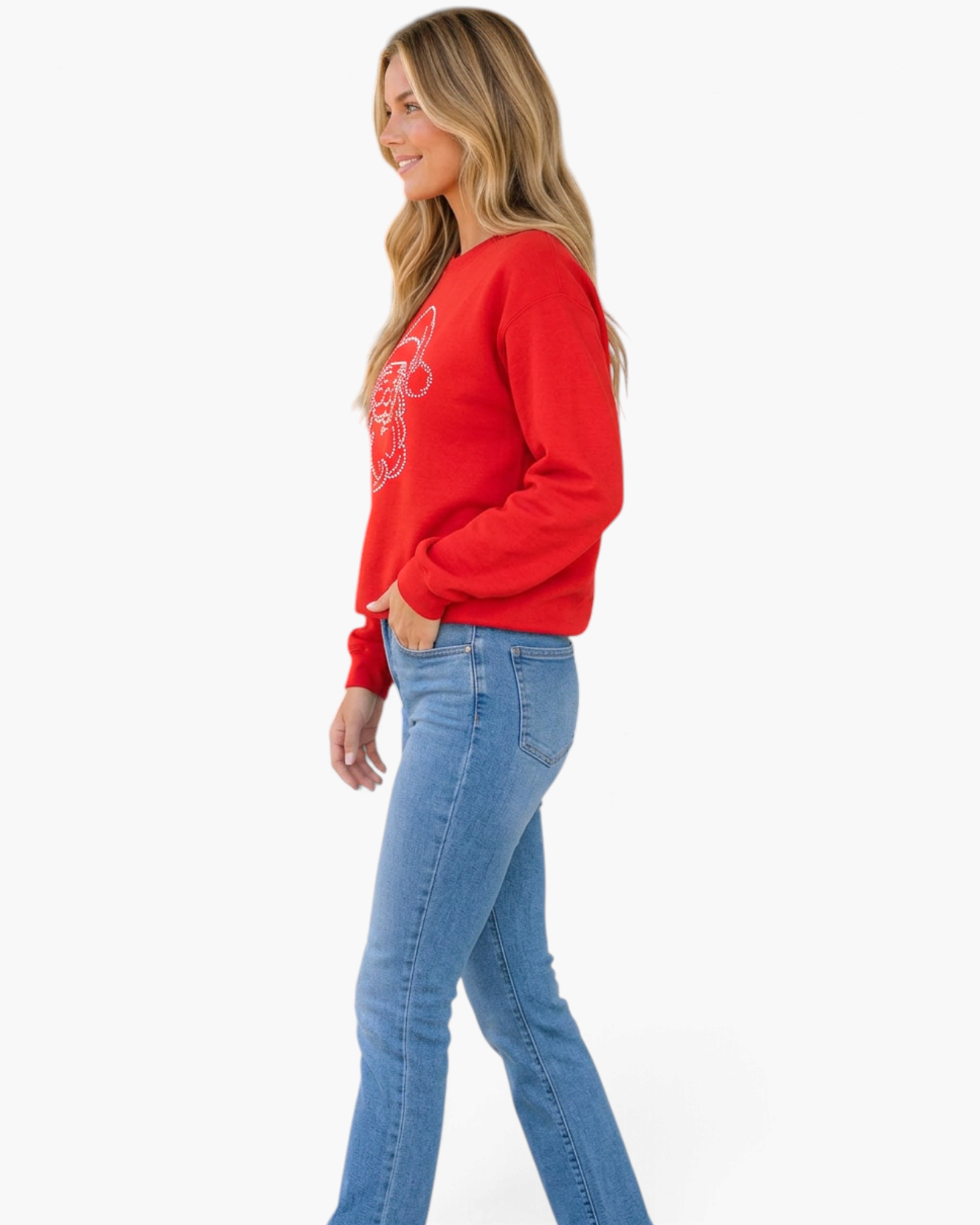 Beach Rose Co. red crewneck sweatshirt with rhinestone Santa face worn by a woman with jeans, side profile view