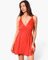 Beach Rose Co. red washed satin crepe cami skater dress with a V-neckline worn by a model against a white background.