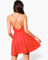 Beach Rose Co. red washed satin crepe skater dress with cami straps and a backless crisscross design