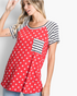 Beach Rose Co. red top with white star print, black-and-white striped raglan sleeves, and a matching chest pocket.