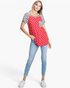 Beach Rose Co. red top with white star print, black-and-white striped raglan sleeves, and a matching chest pocket.
