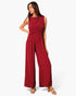 Model wearing a Beach Rose Co. red textured wide-leg jumpsuit with a flattering twist-front waist detail.