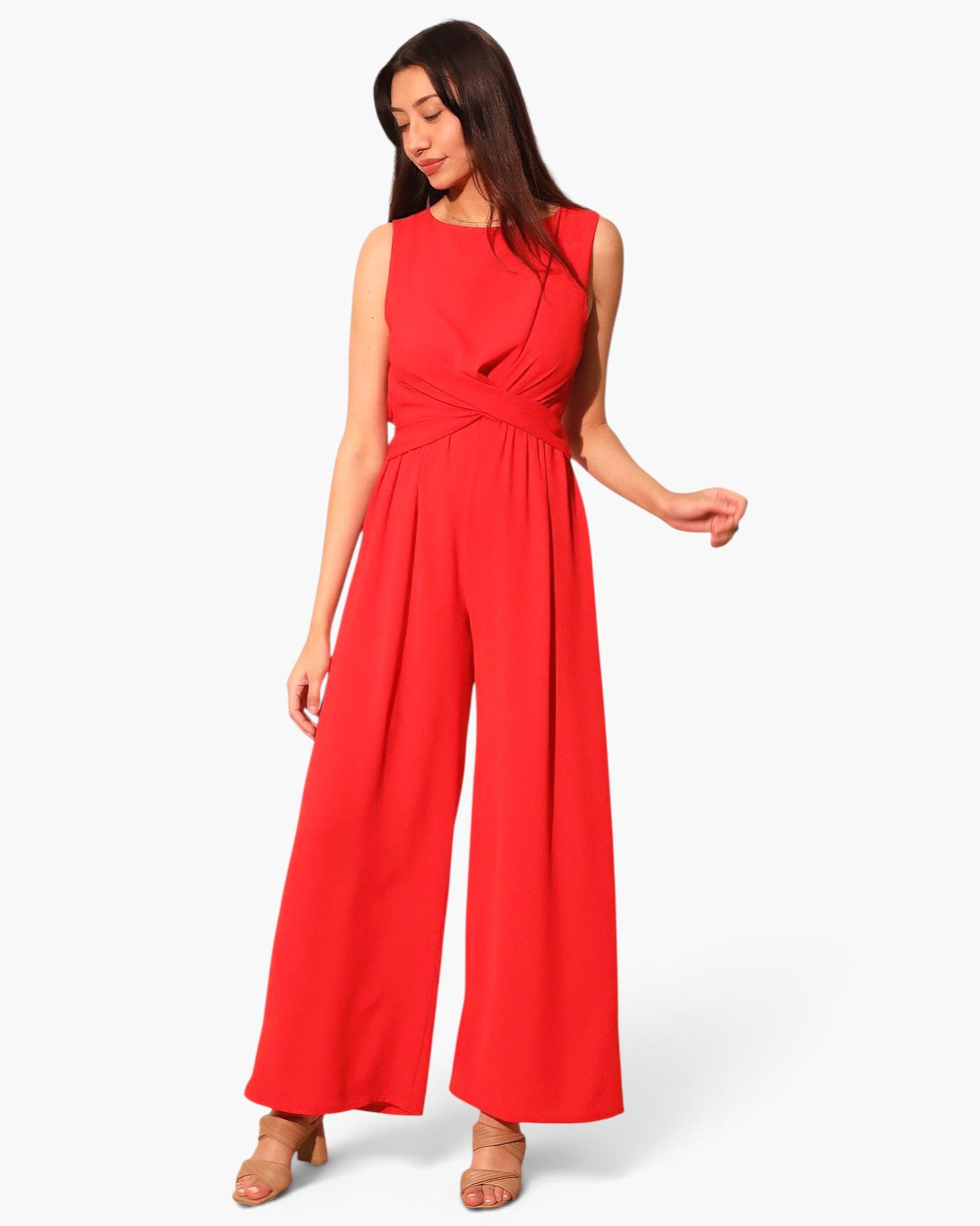 Beach Rose Co. red sleeveless jumpsuit with a twist-front waist and wide-leg silhouette worn by a model