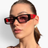 Beach Rose Co. retro rectangular sunglasses with black and red frames, tinted lenses, and gold temple accents on model