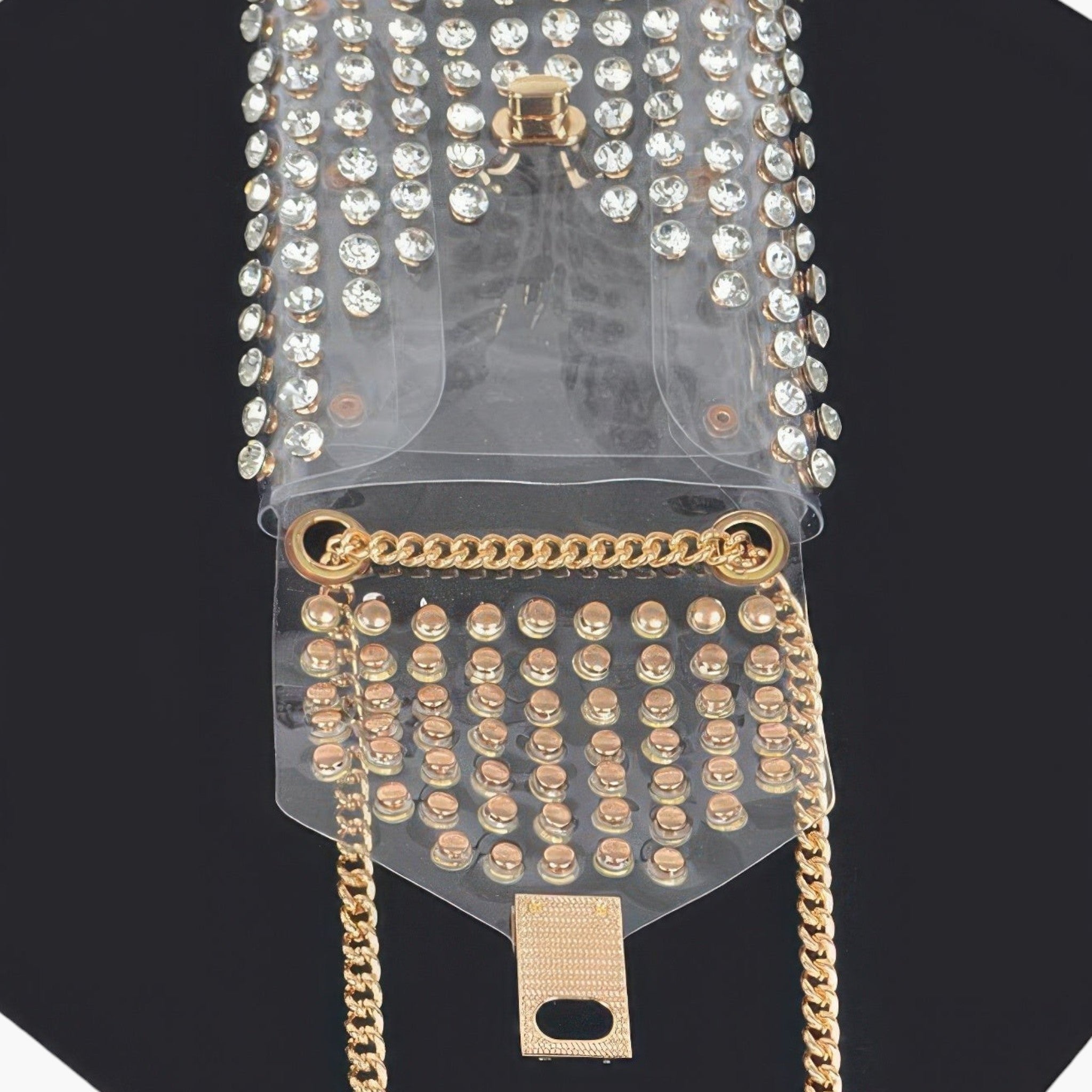 Beach Rose Co. clear PVC belt bag featuring shimmering rhinestones and a gold-tone chain strap on a black background.