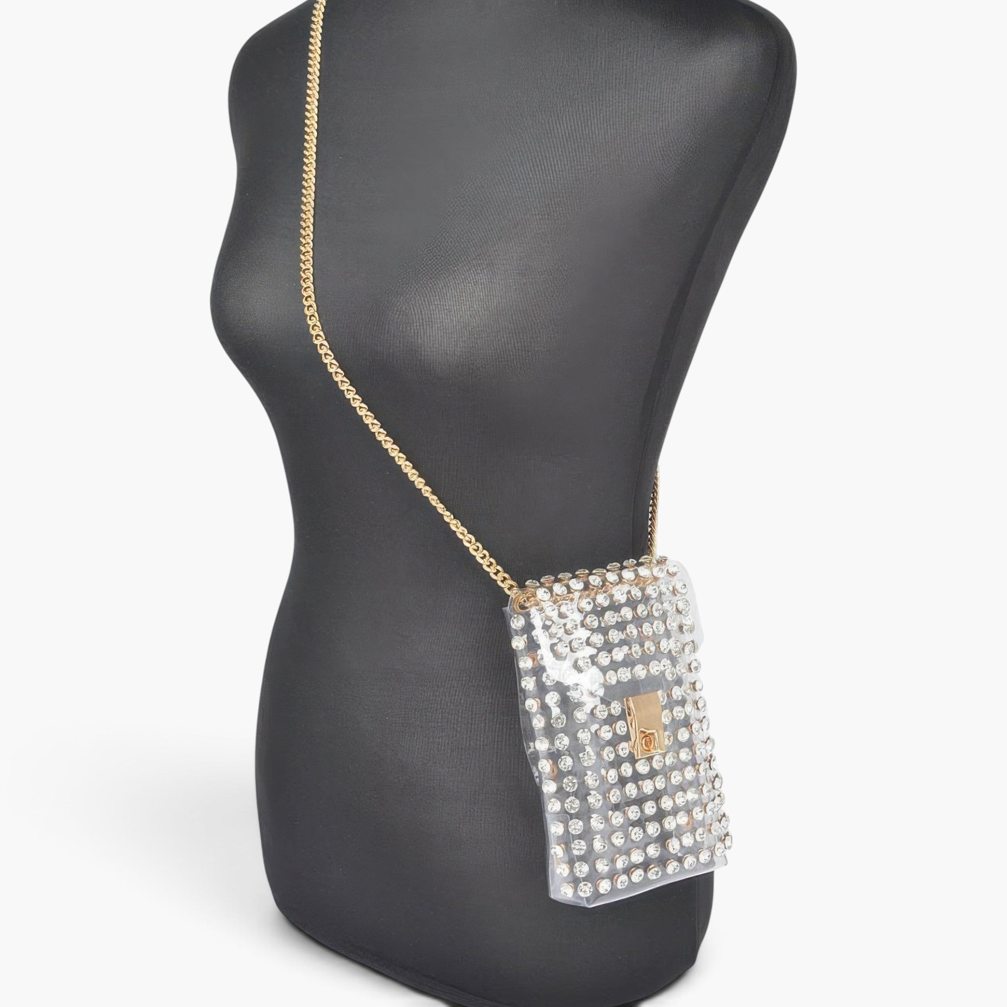 Beach Rose Co. clear PVC belt bag adorned with shimmering rhinestones and a gold-tone chain strap on a mannequin.