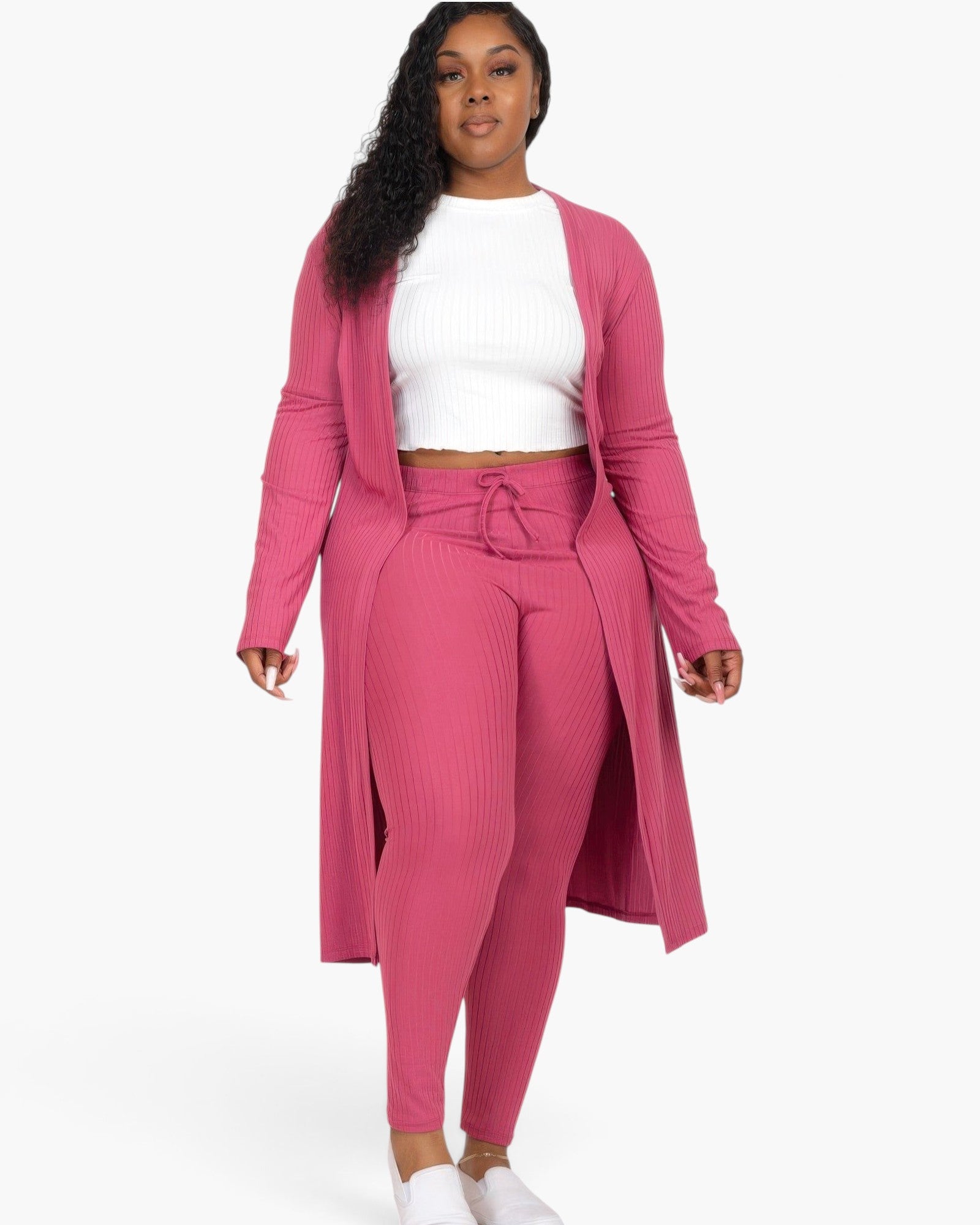 Beach Rose Co. plus size ribbed long cardigan and leggings set in dark mauve worn by a model with a white top.