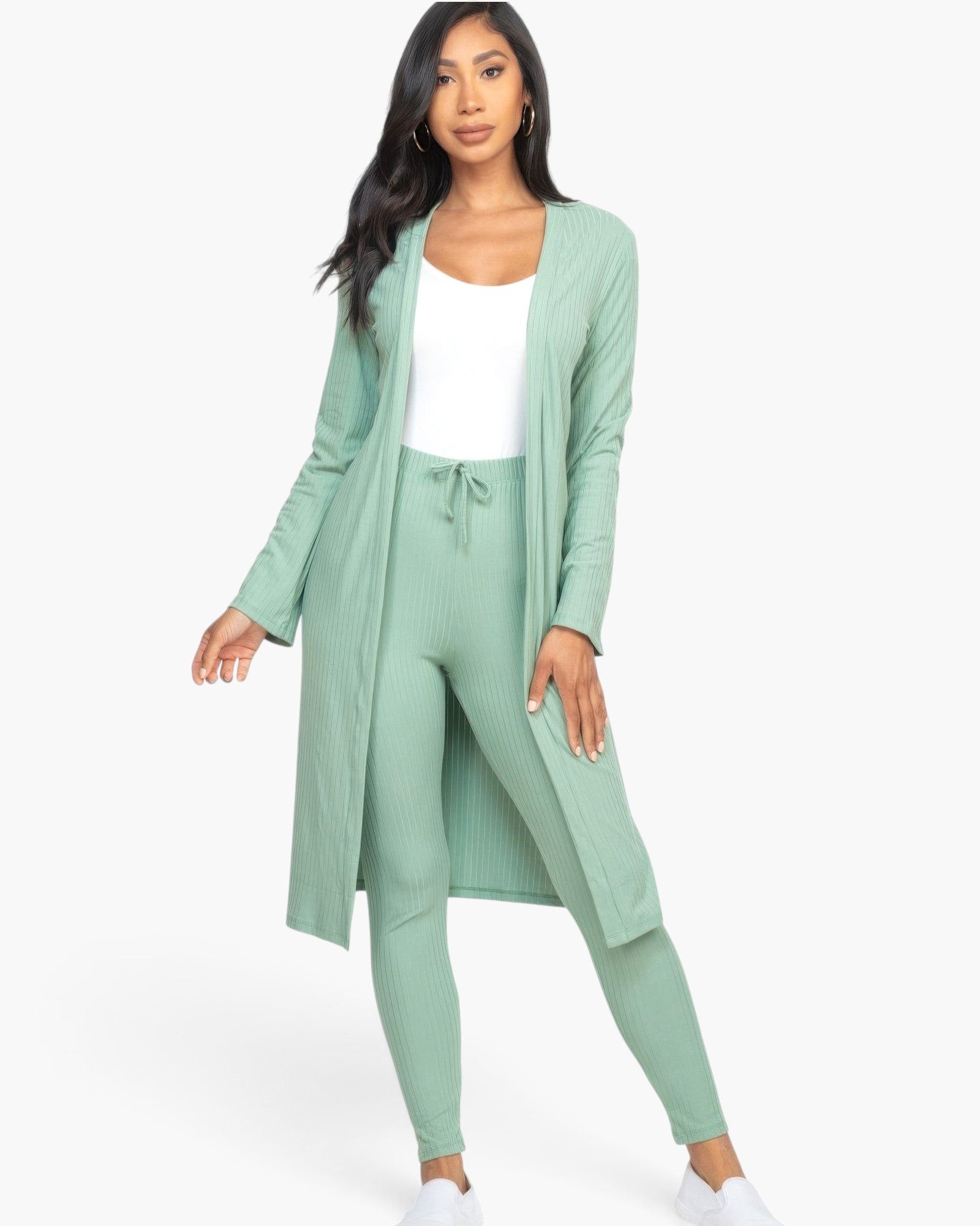 Beach Rose Co. sage green ribbed long cardigan and leggings set worn by a model with a white top and sneakers.