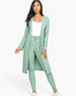 Beach Rose Co. sage green ribbed long cardigan and leggings set worn by a model with a white top and sneakers.