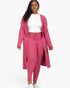 Beach Rose Co. plus size ribbed long cardigan and leggings set in dark mauve worn by a model with a white top.