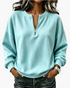 Beach Rose Co. light blue ribbed quarter-zip pullover with dropped shoulders and a relaxed fit worn with dark jeans.