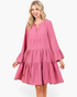 Beach Rose Co. rose tiered shift dress with split neckline and long bell sleeves on a smiling blonde model
