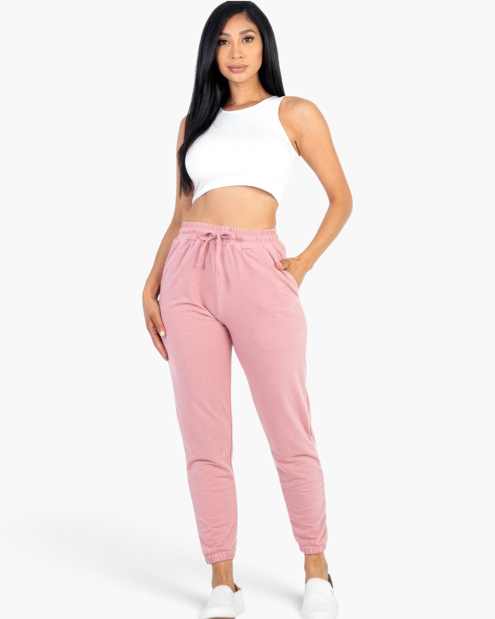 Beach Rose Co. rosewood French Terry jogger pants with an elastic waistband and pockets worn by a model.