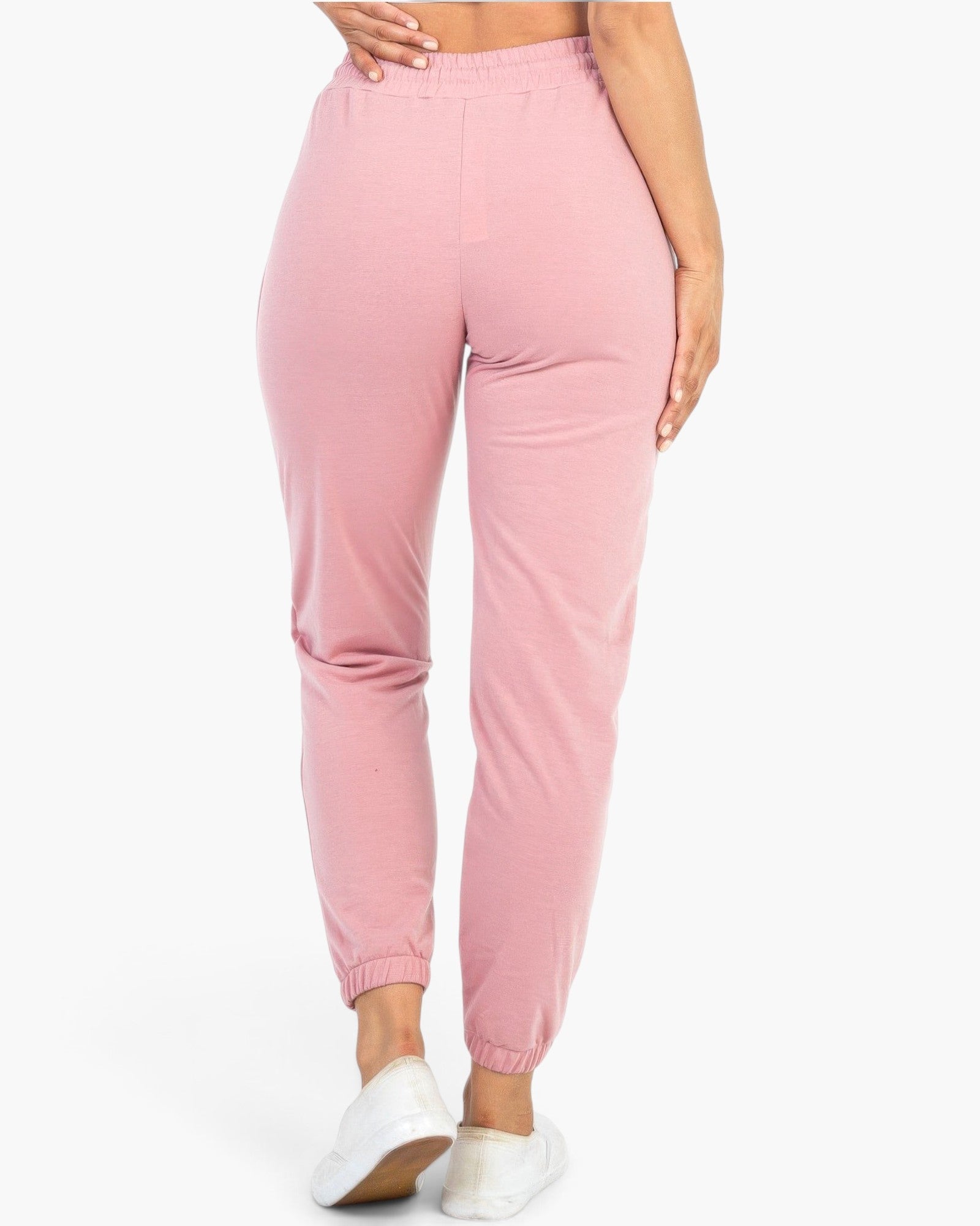 Beach Rose Co. rosewood French Terry jogger pants with elastic cuffs and waistband, shown from the back on a model.