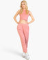 Beach Rose Co. rosewood French Terry tank top and joggers set worn by a blonde model with white sneakers.