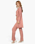 Beach Rose Co. rosewood 3-piece ribbed loungewear set with cami top, straight pants, and long cardigan on a model
