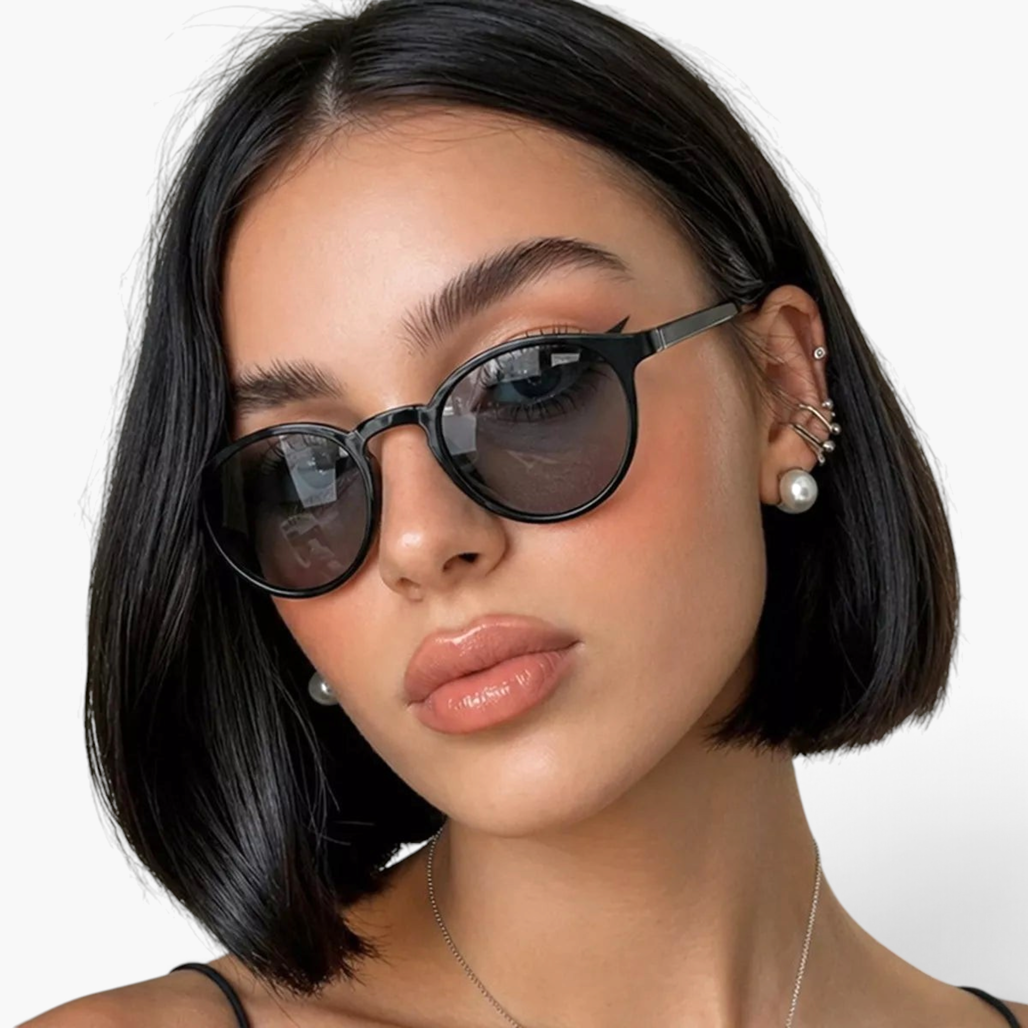 Beach Rose Co. classic round full-rim sunglasses with slim black polycarbonate frames and UV400 lenses on a woman.