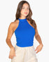 Beach Rose Co. royal blue ribbed halter neck backless top worn by a woman with long brown hair.