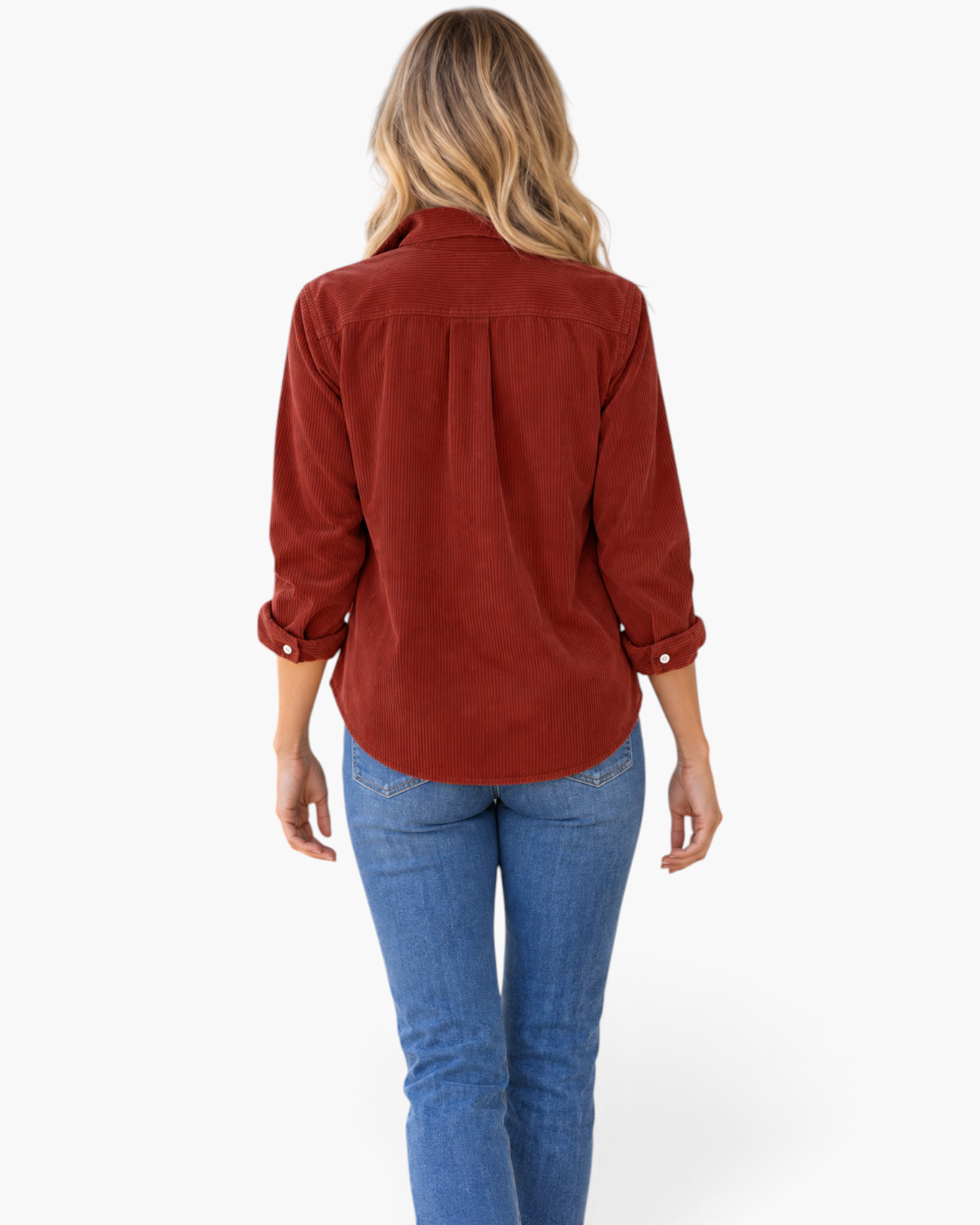 Beach Rose Co. rust corduroy button-front shirt with long sleeves and a curved hem worn by a blonde model