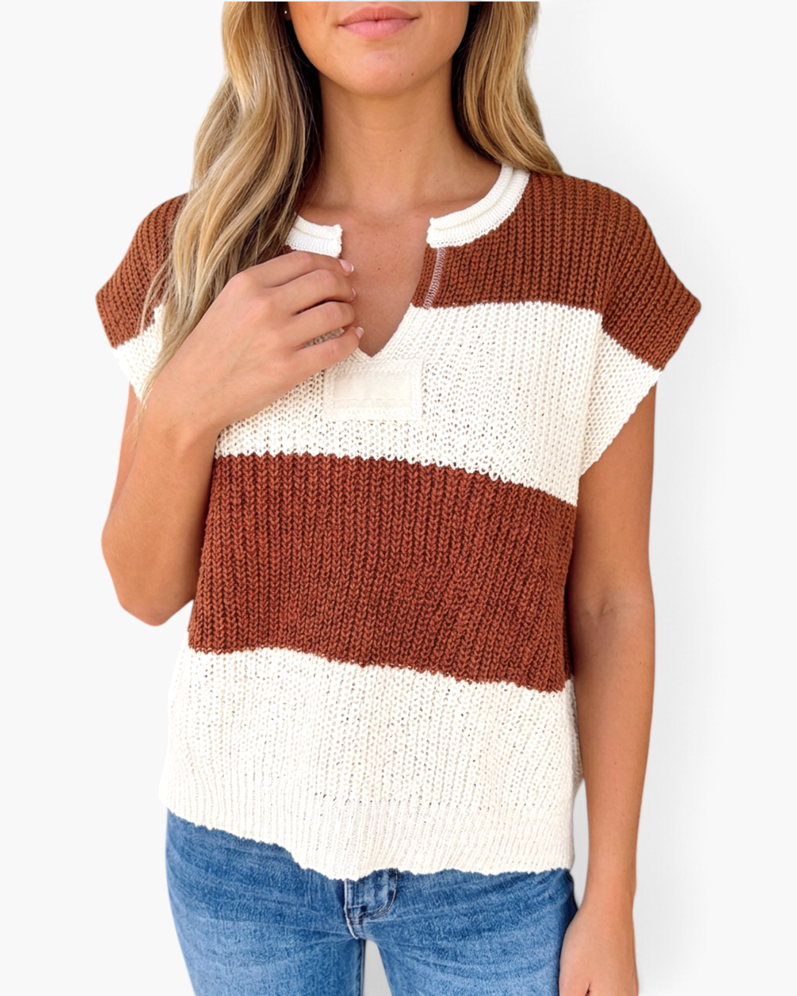 Beach Rose Co. rust and ivory striped open-knit top with a split neckline and cap sleeves worn by a woman.