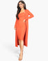 Beach Rose Co. rust orange ribbed cami midi bodycon dress and matching long cardigan set on a model.