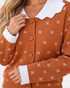 Beach Rose Co. rust cardigan with white knit motifs, a scalloped white collar, and button-front closure.