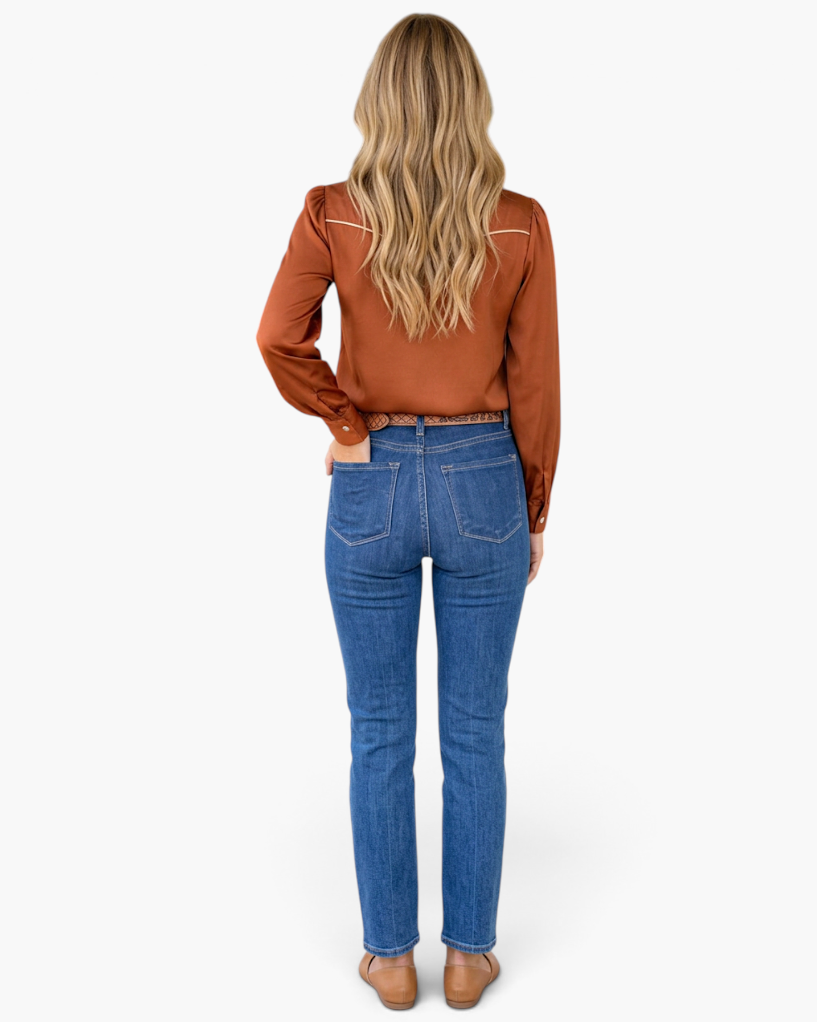Beach Rose Co. rust Western button-up shirt with contrast piping, worn with blue jeans, back view.