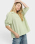 Beach Rose Co. sage green and white gingham puff sleeve collared blouse with split V-neck and elastic cuffs.