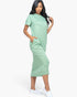 Beach Rose Co. sage green midi tee dress with side pockets worn by a model with white slip-on sneakers