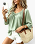 Beach Rose Co. sage green textured V-neck blouse with loose three-quarter sleeves and a relaxed fit.