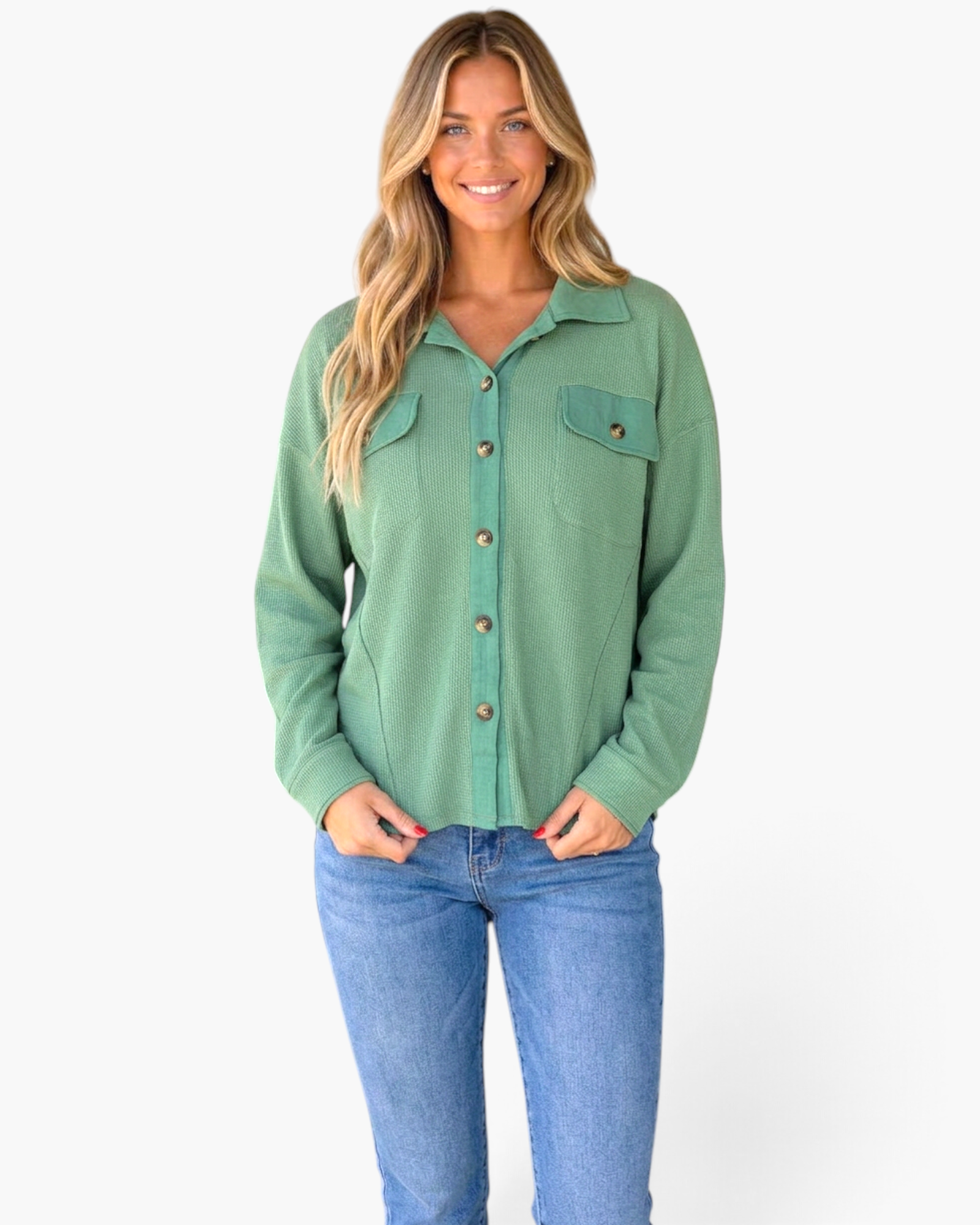 Beach Rose Co. sage green waffle knit button-front shirt with chest pockets worn by a smiling woman in blue jeans