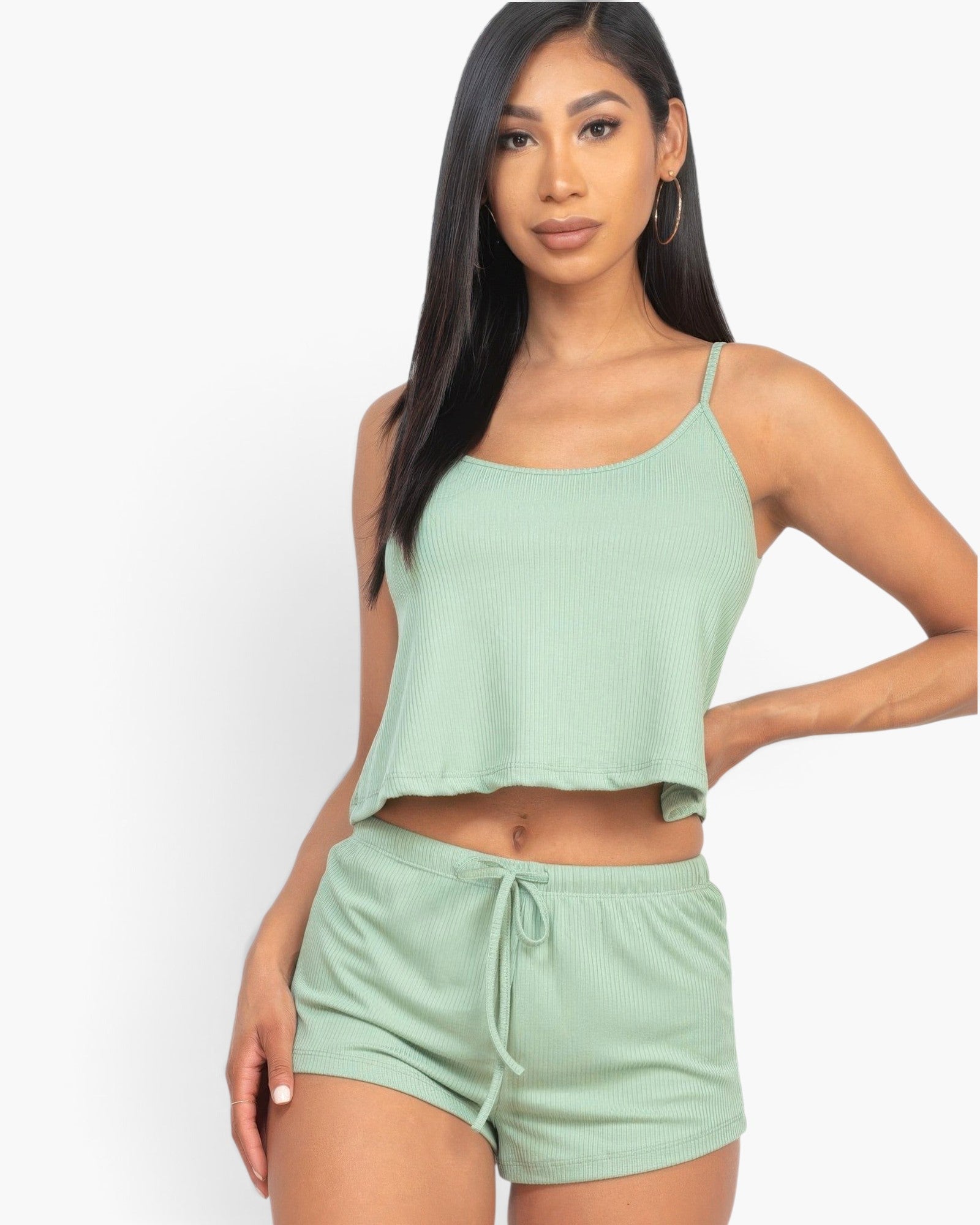 Beach Rose Co. sage green ribbed strappy top and matching drawstring shorts set worn by a woman