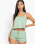 Beach Rose Co. sage green ribbed strappy top and matching drawstring shorts set worn by a woman