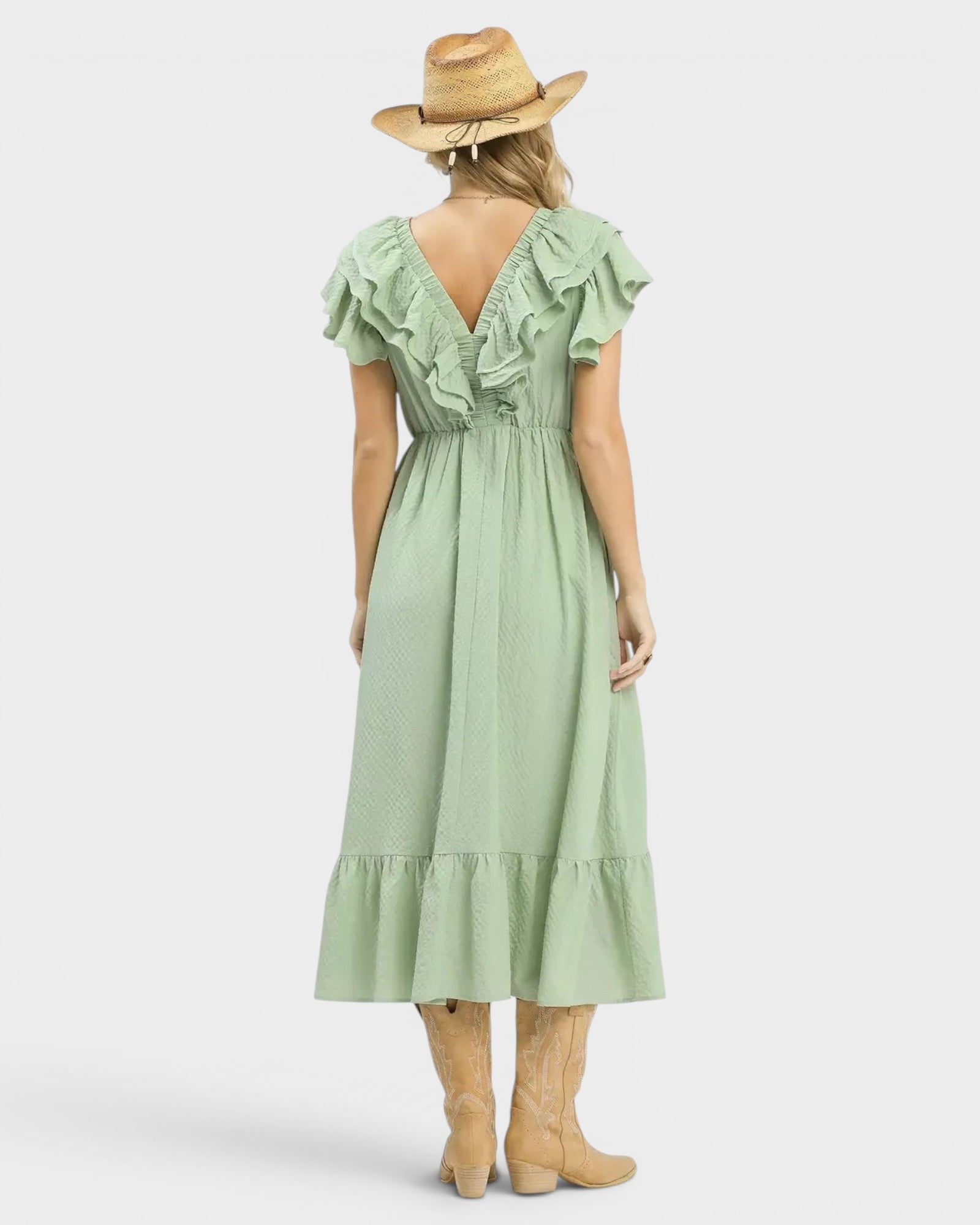 Beach Rose Co. sage green textured midi dress with ruffled V-neck, flutter sleeves, and ruffle hem. Relaxed empire waist, side pockets.