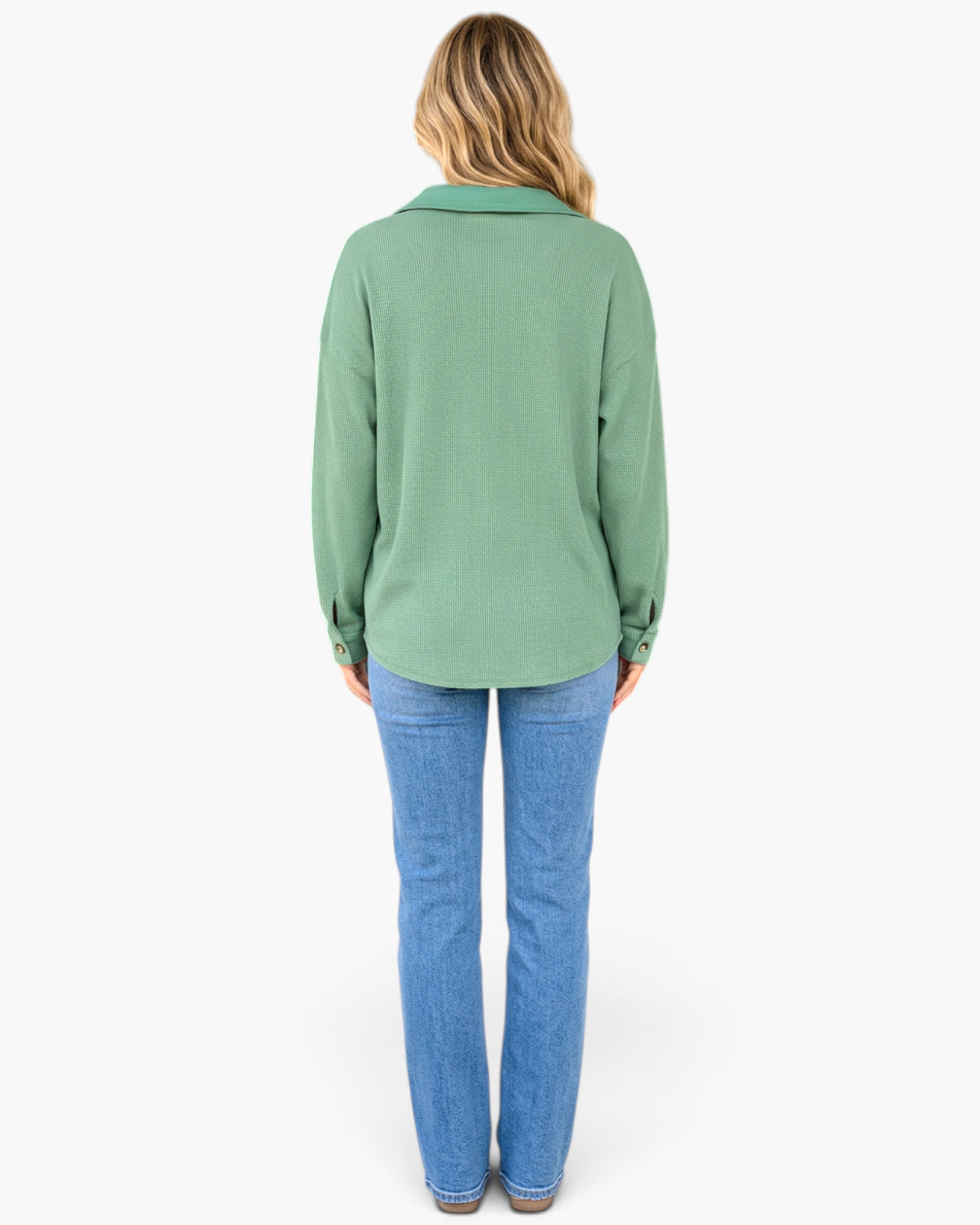 Beach Rose Co. sage green waffle knit button-front shirt with long sleeves and curved hem, back view on a model.