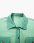 Beach Rose Co. sage green waffle knit shirt with a collared neckline, button front, and textured fabric detail.